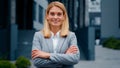 Successful happy young businesswoman walks on street confident proud woman professional office manager posing with Royalty Free Stock Photo