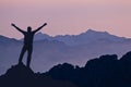 Successful hiking or climbing silhouette in mountains Royalty Free Stock Photo