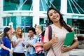 Successful latin american female student showing thumb up Royalty Free Stock Photo