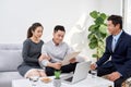 Successful lawyer giving consultation to family couple about buying house Royalty Free Stock Photo