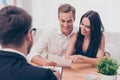 Successful lawyer giving consultation to family couple about buying house Royalty Free Stock Photo