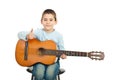 Successful little guitarist with guitar