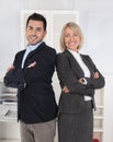 Successful male and female business team: senior and junior managing director. Royalty Free Stock Photo