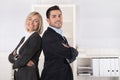 Successful male and female business team: senior and junior managing director. Royalty Free Stock Photo