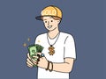 Successful male rapper with dollars in hands Royalty Free Stock Photo