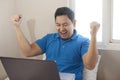 Successful Man Celebrating Victory, Entrepreneur Working Online Business From Home