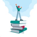 Successful man standing on big book stack Royalty Free Stock Photo