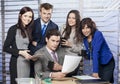 Successful manager surround by his business team Royalty Free Stock Photo