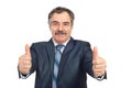 Successful mature business man gives thumbs Royalty Free Stock Photo