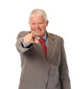 Successful mature businessman pointing