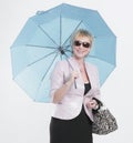 Successful modern woman with a parasol.isolated on white