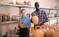 Successful potters in ceramic workshop