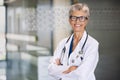 Successful senior doctor smiling Royalty Free Stock Photo