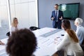 Successful team leader and business owner leading informal in-house business meeting Royalty Free Stock Photo