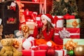 Successful shopping on xmas market. decorated with gifts. shopping packages christmas sale. santa helper sort presents Royalty Free Stock Photo
