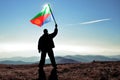 Successful silhouette man winner waving Eritrea flag