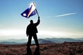 Successful silhouette man winner waving Marshall Islands flag Royalty Free Stock Photo