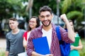 Successful spanish male student with group of other students Royalty Free Stock Photo