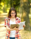 Successful student with books in the Park Royalty Free Stock Photo