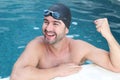 Successful swimmer smiling in the water Royalty Free Stock Photo