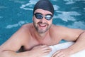 Successful swimmer smiling in the water Royalty Free Stock Photo