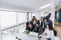 Successful team. Group of young business people working and communicating together in creative office Royalty Free Stock Photo