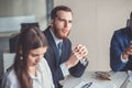 Team leader and business owner leading informal in-house business meeting Royalty Free Stock Photo