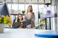 Successful team of new business startup people working together in creative office, happy euphoric proud Asian male and female Royalty Free Stock Photo