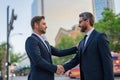 Successful teamwork. Business people shaking hands. Handshake between two business men. Two businessmen shaking hands on Royalty Free Stock Photo