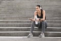 After Successful Training. Sporty Girl Resting On Urban Stairs After Exercising Outdoors Royalty Free Stock Photo