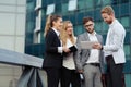 Business people and coworkers outside