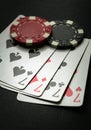 Successful win with four playing cards. Poker game with four of a kind or quads combination Royalty Free Stock Photo