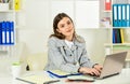 Successful woman work online on computer. confident office worker. secretary with document folder. formal fashion style Royalty Free Stock Photo