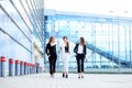 Successful women go and discuss a new project. Concept for business, boss, robot, team and success Royalty Free Stock Photo