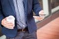 Successful young asian man in business casual attire in relaxing