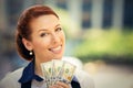 Successful young business woman holding money dollar bills in hand Royalty Free Stock Photo