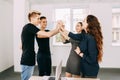 Creative team cheering giving a high fives gesture Royalty Free Stock Photo