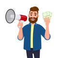 Successful young man holding a megaphone or loudspeaker and showing bunch or cash, money, currency, bank notes in hand. Royalty Free Stock Photo