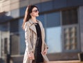 Successful young woman standing on the street near the office building Royalty Free Stock Photo