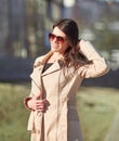 Successful young woman standing on the street near the office building Royalty Free Stock Photo