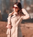 Successful young woman standing on the street near the office building Royalty Free Stock Photo