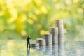 Succession ,Finance, Business, Money, Security and Saving Concept. Close up of businessman miniature figures standing and looking