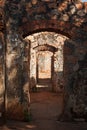 SUCCESSIVE DOOR ENTRANCES CONNECTING THE INNER CHAMBER OF A ROOFLESS FORT COMPLEX IN RUINS