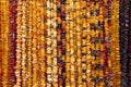 Succinite. Amber necklace. Amber of different colors and sizes. Royalty Free Stock Photo