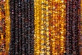 Succinite. Amber necklace. Amber of different colors and sizes. Royalty Free Stock Photo