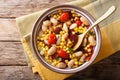 Succotash of corn, butter beans, tomatoes and bacon close up in Royalty Free Stock Photo