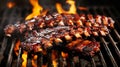 Succulent american bbq ribs sizzling on grill over natural charcoal fire with smoky juicy meat Royalty Free Stock Photo