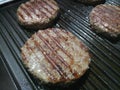 Succulent beef burger grilling