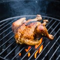 Succulent chicken grilling on an open flame