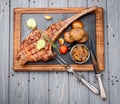 Succulent grilled tomahawk beef steak on the bone Royalty Free Stock Photo